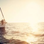 Couple on boat, sunset