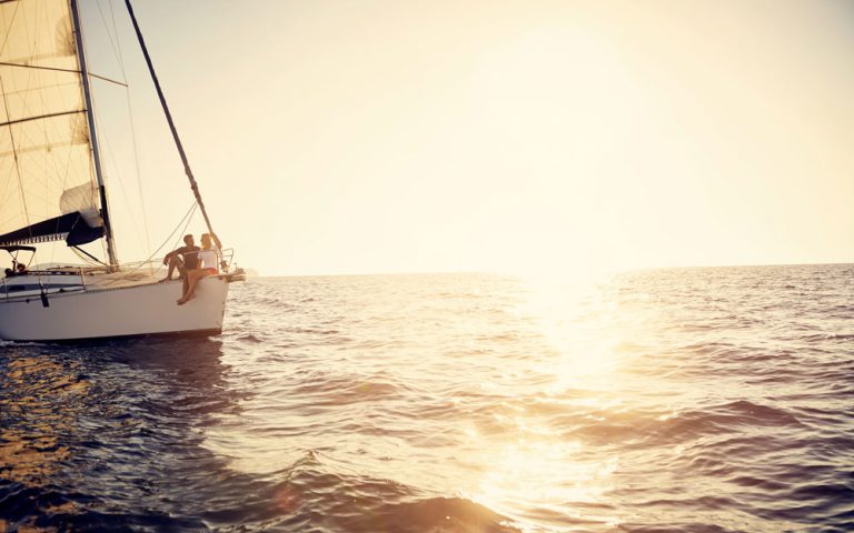 Couple on boat, sunset